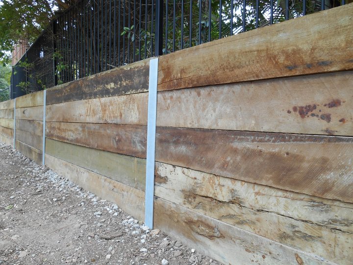 Treated pine retaining walls with steel posts